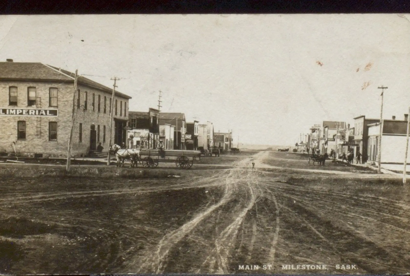 Main Street with the Imperial hotel and horse-drawn wagon